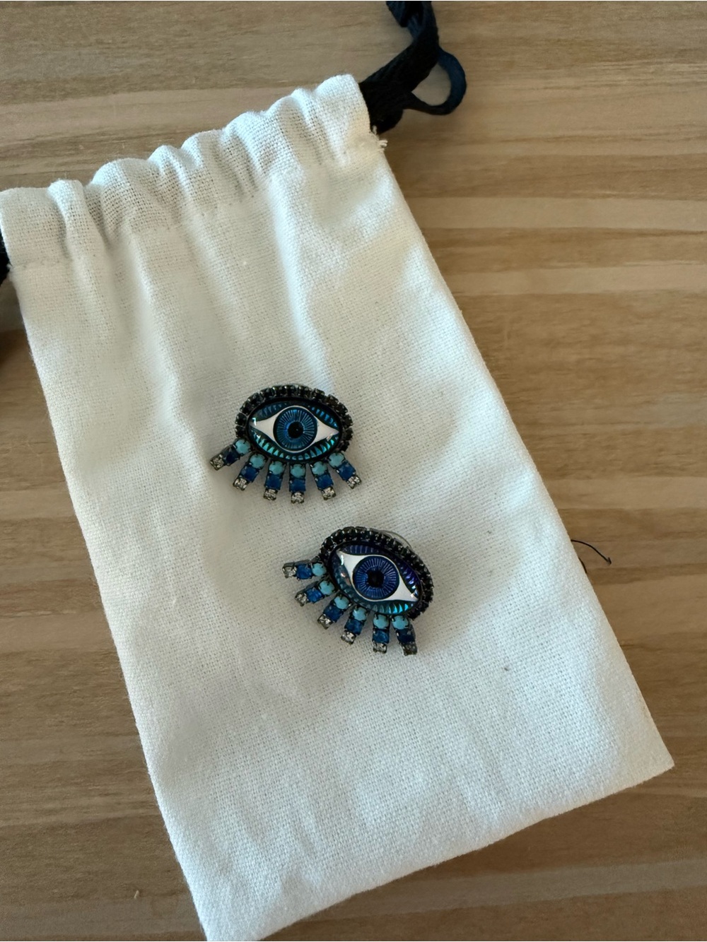 Elizabeth Cole blue evil eye earrings